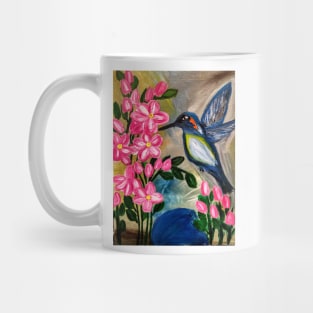 hummingbird feeding on some nectar Mug